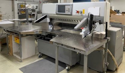 Large sized cutting system Polar 137 XT-AT with stacking lifter, automatic vibrator, scale and optional unloader